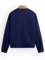 Abbott-Elementary-S05-Chris-Perfetti-Blue-Jacket-Back