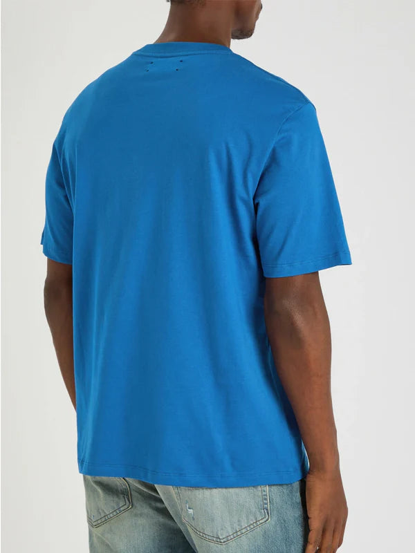 Blue-Amiri-Staggered-Logo-Tee-Back