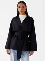 Cropped black trench coat modern look