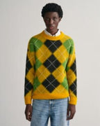 Jingle Bell Heist 2025 Olivia Holt Yellow Fuzzy Sweater
