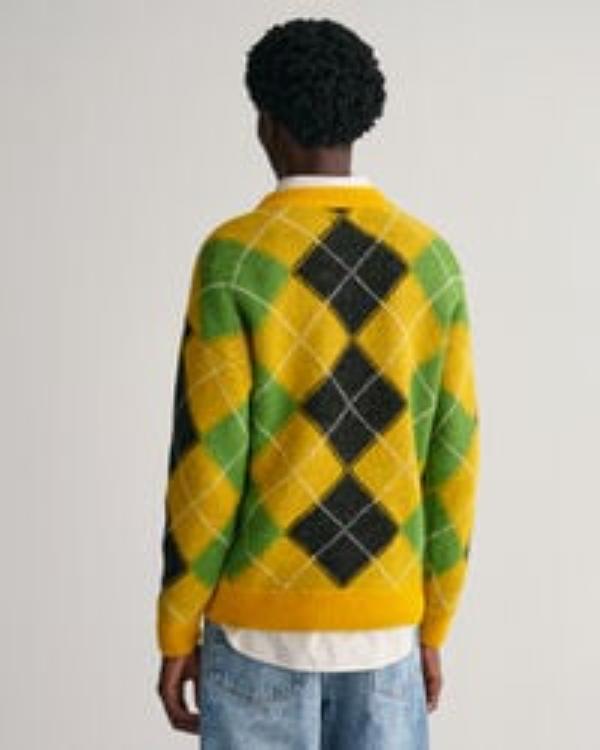 Jingle Bell Heist 2025 Olivia Holt Yellow Fuzzy Sweater