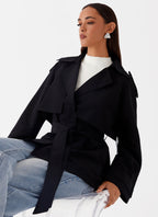 Women's black short trench coat outfit