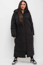 Women's extra long black puffer
